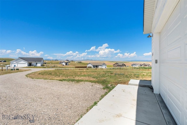 15 Santa Fe Trl, Three Forks, MT 59752 - view of yard with a patio and a garage