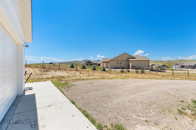 15 Santa Fe Trl, Three Forks, MT 59752 - view of yard featuring a garage