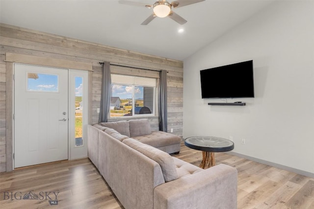 15 Santa Fe Trl, Three Forks, MT 59752 - living area with vaulted ceiling, wood walls, a ceiling fan, light wood-type flooring, and recessed lighting
