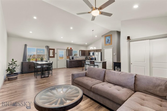 15 Santa Fe Trl, Three Forks, MT 59752 - living room featuring light wood-style floors, recessed lighting, a chandelier, a ceiling fan, and high vaulted ceiling