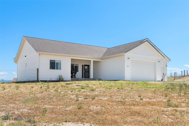 15 Santa Fe Trl, Three Forks, MT 59752 - ranch-style home featuring a garage and a shingled roof