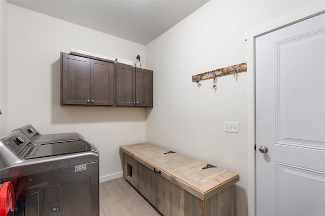 15 Santa Fe Trl, Three Forks, MT 59752 - laundry room featuring washer and dryer, light wood-style floors, and cabinet space