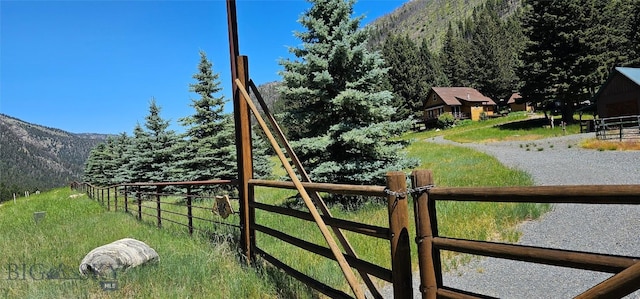 1105 S Boulder Rd, Cardwell, MT 59721 - gate with a mountain view and a wooded view