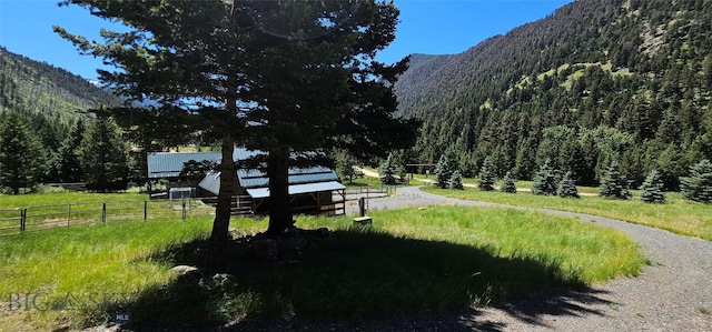 1105 S Boulder Rd, Cardwell, MT 59721 - view of home's community with a mountain view and a wooded view