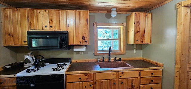 1105 S Boulder Rd, Cardwell, MT 59721 - kitchen featuring black microwave, gas stove, and wooden ceiling