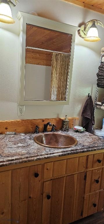 1105 S Boulder Rd, Cardwell, MT 59721 - bathroom featuring vanity and wooden ceiling