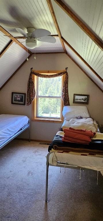 1105 S Boulder Rd, Cardwell, MT 59721 - bedroom with lofted ceiling, carpet, and a ceiling fan