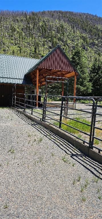 1105 S Boulder Rd, Cardwell, MT 59721 - stable featuring a wooded view