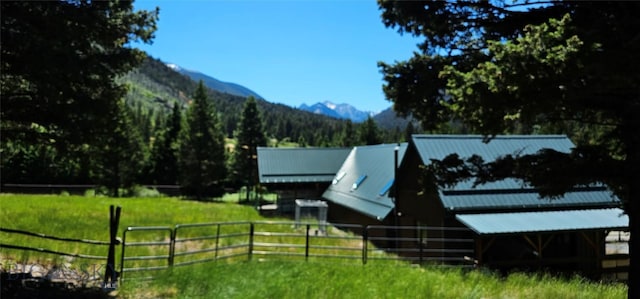 1105 S Boulder Rd, Cardwell, MT 59721 - view of yard with a mountain view, a barn, an outdoor structure, and a view of trees