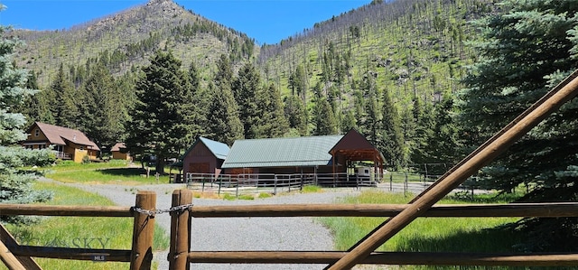 1105 S Boulder Rd, Cardwell, MT 59721 - view of mountain backdrop with a heavily wooded area