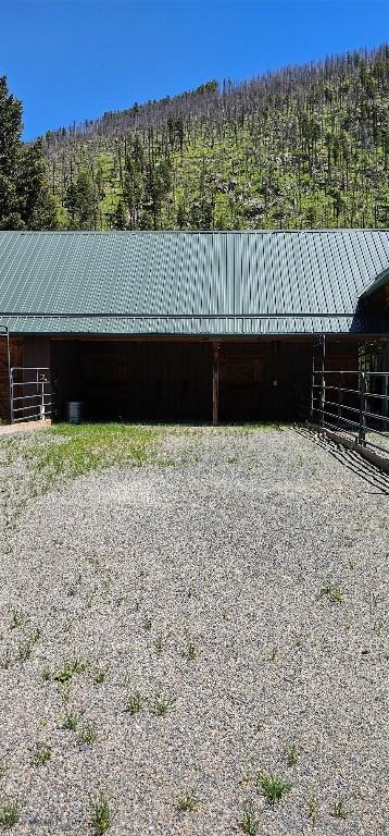 1105 S Boulder Rd, Cardwell, MT 59721 - stable with a forest view