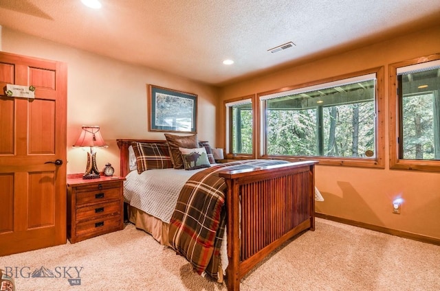 953 Angel Point Rd, Lakeside, MT 59922 - carpeted bedroom with recessed lighting and a textured ceiling