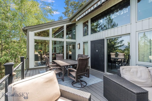 953 Angel Point Rd, Lakeside, MT 59922 - wooden deck with outdoor dining space