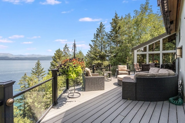 953 Angel Point Rd, Lakeside, MT 59922 - deck featuring a water and mountain view and an outdoor hangout area