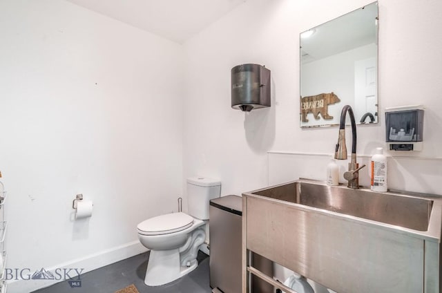 953 Angel Point Rd, Lakeside, MT 59922 - half bathroom with a sink and toilet