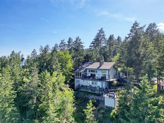 953 Angel Point Rd, Lakeside, MT 59922 - aerial view of property and surrounding area featuring a heavily wooded area