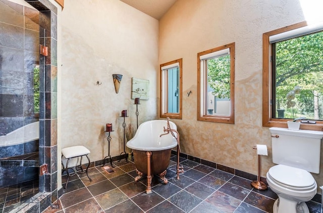 953 Angel Point Rd, Lakeside, MT 59922 - bathroom with a freestanding bath and a tile shower