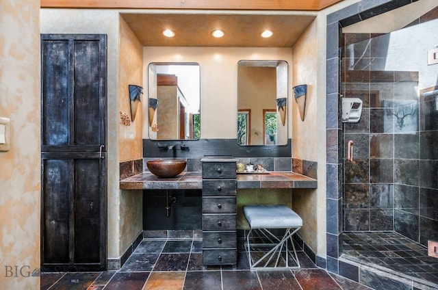 953 Angel Point Rd, Lakeside, MT 59922 - full bath featuring a stall shower, recessed lighting, and stone finish flooring