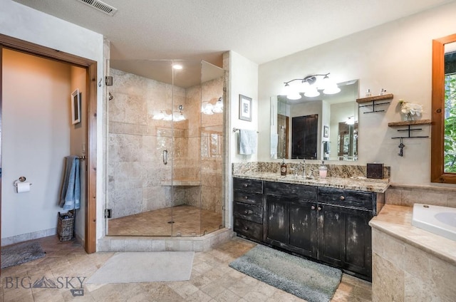 953 Angel Point Rd, Lakeside, MT 59922 - bathroom with a shower stall, vanity, and a garden tub
