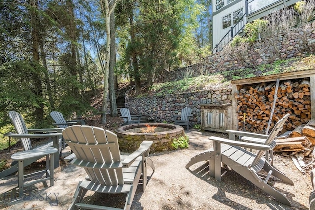 953 Angel Point Rd, Lakeside, MT 59922 - view of patio / terrace with a fire pit