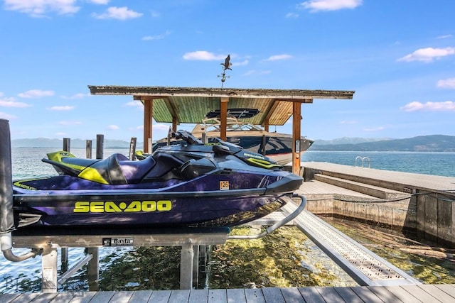 953 Angel Point Rd, Lakeside, MT 59922 - dock featuring a water and mountain view