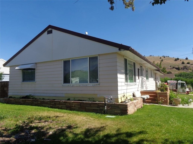 120 Balsam St, Anaconda, MT 59711 - view of side of home featuring a lawn
