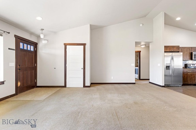 343 Stewart Loop, Bozeman, MT 59718 - foyer featuring light colored carpet, vaulted ceiling, and recessed lighting
