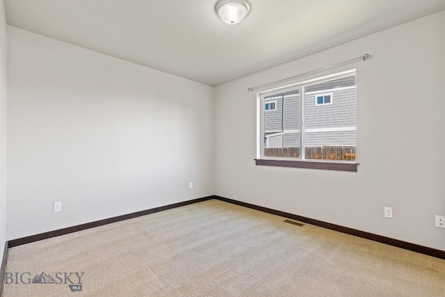 343 Stewart Loop, Bozeman, MT 59718 - carpeted empty room featuring baseboards