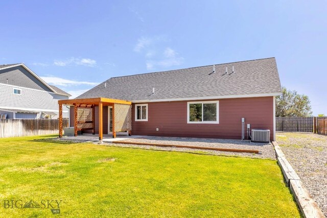 343 Stewart Loop, Bozeman, MT 59718 - rear view of house featuring a patio area, a fenced backyard, and a shingled roof
