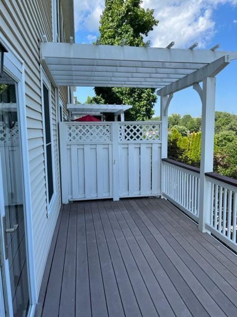 wooden terrace featuring a pergola