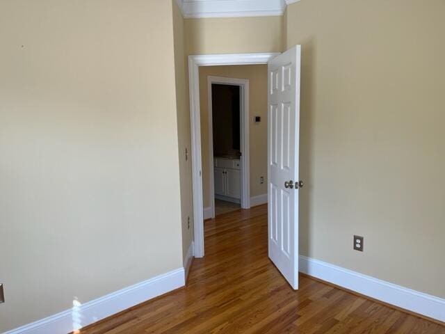 unfurnished room featuring dark wood-type flooring