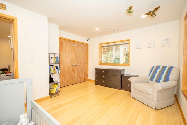 living area featuring light hardwood / wood-style floors