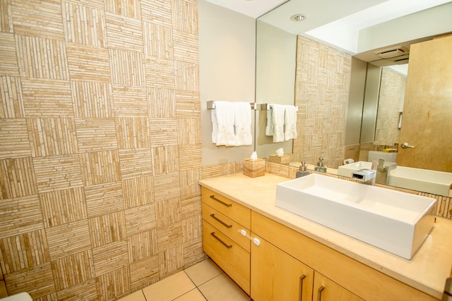 bathroom featuring tile floors and vanity