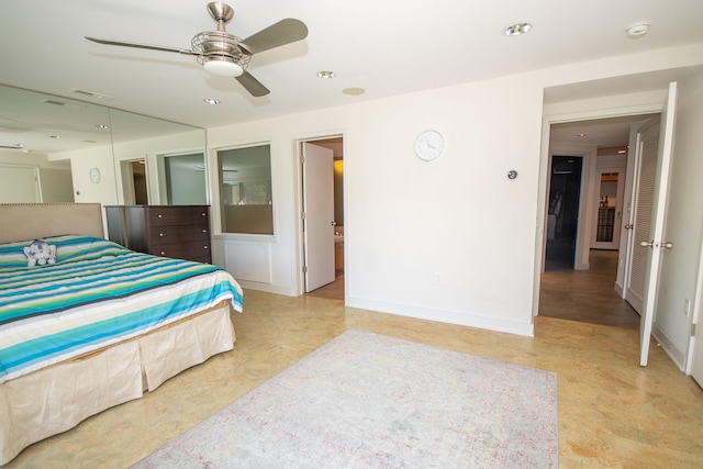 tiled bedroom with ceiling fan