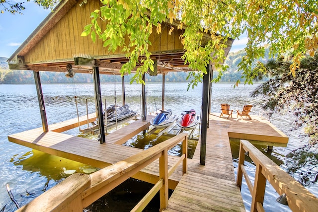 view of dock featuring a water view