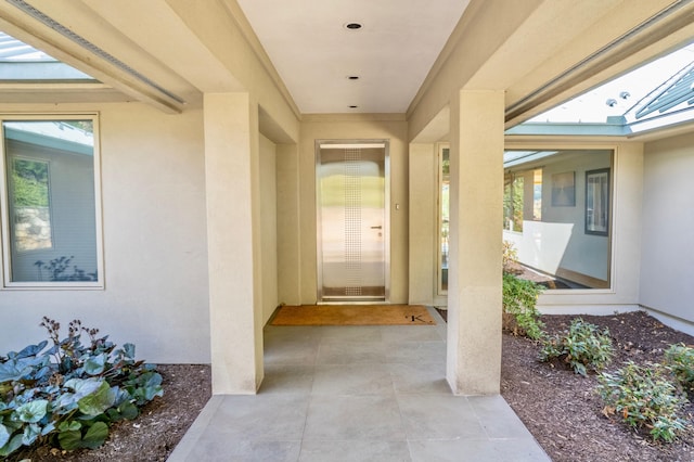 doorway to property with a patio area