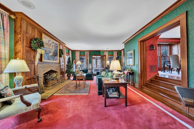 carpeted living room with ornamental molding