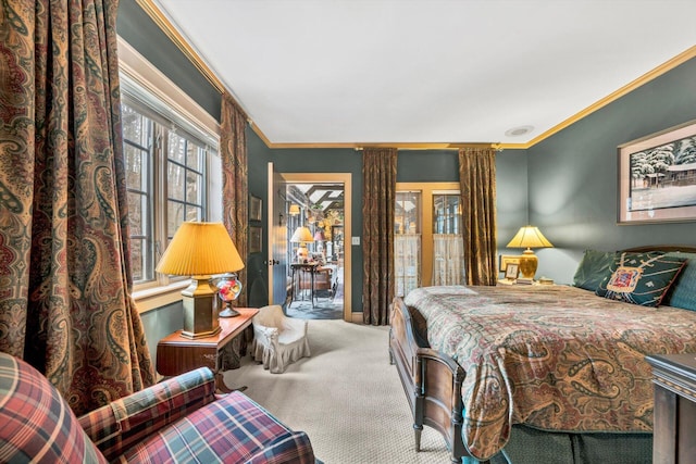 bedroom featuring carpet and crown molding