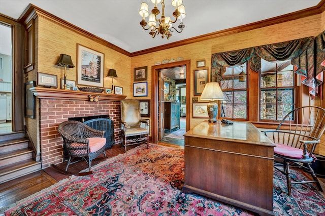 office space featuring an inviting chandelier, ornamental molding, dark hardwood / wood-style flooring, and a brick fireplace