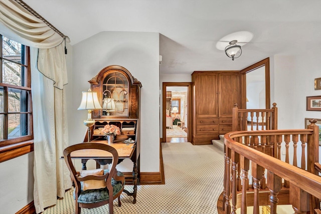 interior space featuring light colored carpet