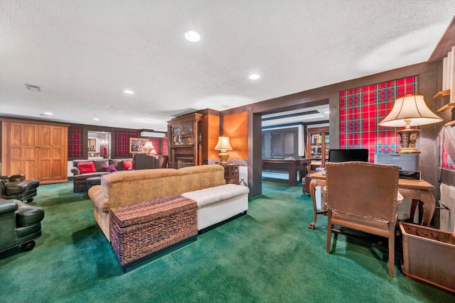 carpeted living room featuring a textured ceiling