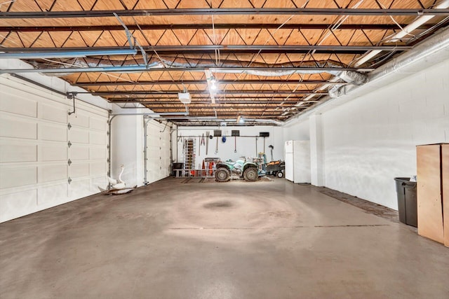 basement with white fridge