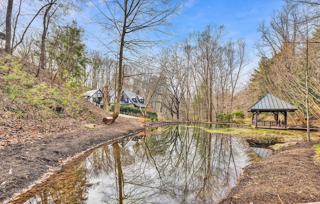 property view of water with a gazebo