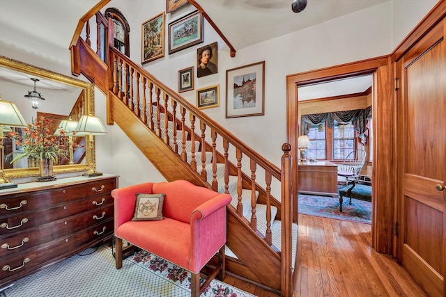 stairway featuring light hardwood / wood-style floors