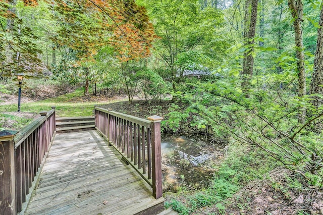 deck featuring a water view