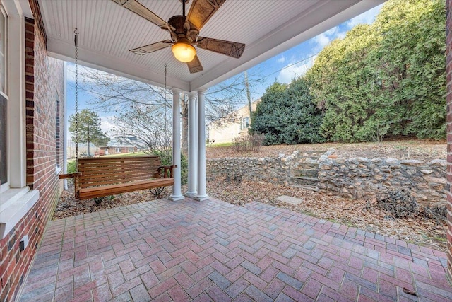 view of terrace featuring ceiling fan