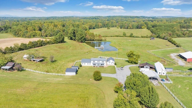 aerial view featuring a rural view and a water view