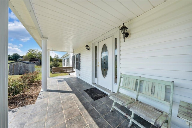 view of terrace featuring a porch