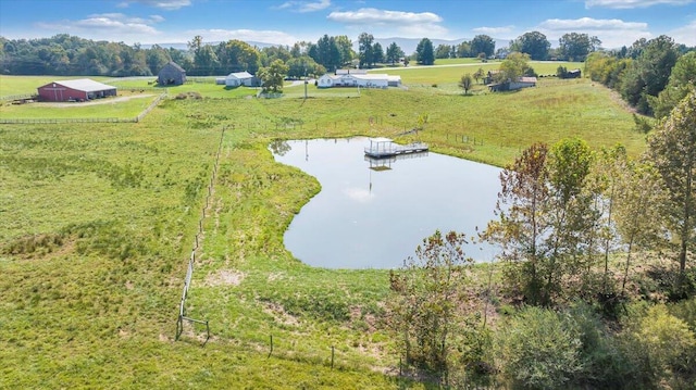 aerial view featuring a rural view and a water view