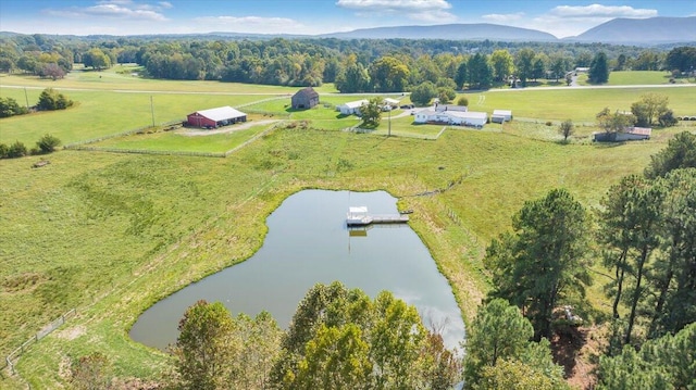 birds eye view of property with a rural view and a water and mountain view